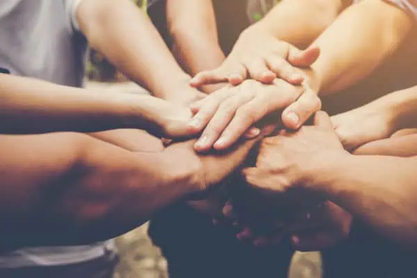 22/5000 Teamwork - Rollo Solar Business teamwork join hands together. Business teamwork concept